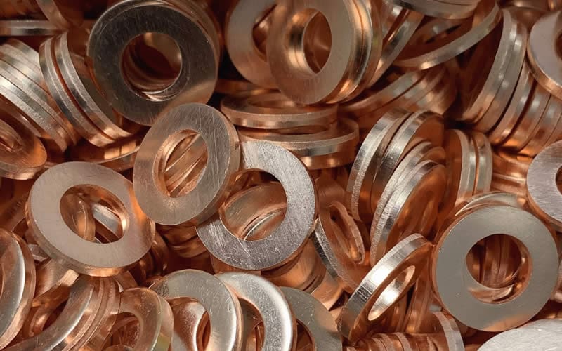 Annealed Copper Washers Pile of copper shim washers